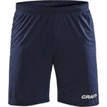 CRAFT Progress -miesten pitkät ergonomisesti muotoillut kontrastiväriset pelishortsit Laivastonsininen/valkoinen (390900)