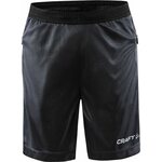 CRAFT Evolve -lasten treenishortsit vetoketjutaskuilla Asfaltti (995000)